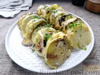 Фото к рецепту: Кабачки, запечённые с картофелем и грибами, в сливках
