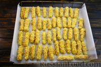 Фото приготовления рецепта: Наггетсы из кабачков в хрустящей панировке (в духовке) - шаг №16