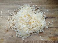 Фото приготовления рецепта: Гренки с яйцами Орсини и сыром (в духовке) - шаг №7