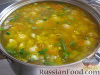 Фото приготовления рецепта: Рисовый суп с цветной капустой и спаржевой фасолью - шаг №9