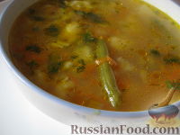 Фото приготовления рецепта: Рисовый суп с цветной капустой и спаржевой фасолью - шаг №10