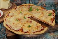 Фото к рецепту: Домашняя пицца с колбасой и сыром