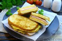 Фото приготовления рецепта: Горячие бутерброды с яйцом, ветчиной и сыром (на сковороде) - шаг №14
