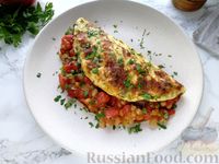 Фото приготовления рецепта: Омлет с консервированной фасолью, помидором и сыром - шаг №16
