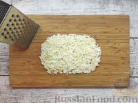 Фото приготовления рецепта: Салат "Кролик" с ветчиной, рисом, кукурузой и огурцом - шаг №5