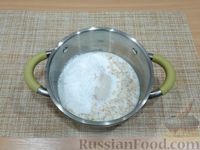 Фото приготовления рецепта: Молочная овсяная каша с ананасом и кокосовой стружкой - шаг №3