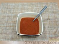 Фото приготовления рецепта: Свинина, тушенная в томатном соусе - шаг №10
