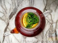 Фото приготовления рецепта: Апельсиновый чай с мятой - шаг №7