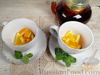 Фото приготовления рецепта: Апельсиновый чай с мятой - шаг №8