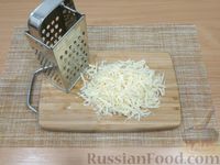Фото приготовления рецепта: Рис с курицей и сыром (на сковороде) - шаг №9