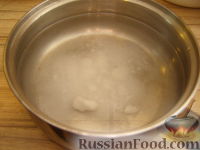 Фото приготовления рецепта: Картофельные оладьи на кефире - шаг №6