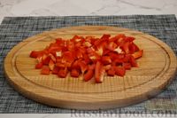 Фото приготовления рецепта: Рагу с курицей, картофелем, сладким перцем и помидором - шаг №9