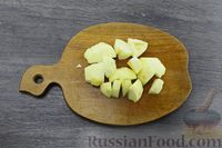 Фото приготовления рецепта: Рыба, запечённая с картофелем и яблоками - шаг №6