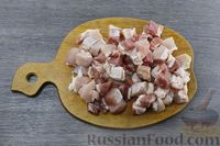 Фото приготовления рецепта: Свинина, тушенная с мандаринами и розмарином - шаг №2