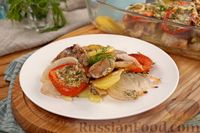 Фото к рецепту: Рыба, запечённая с картошкой и помидорами