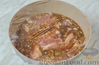 Фото приготовления рецепта: Запечённые свиные рёбрышки в кофейном маринаде - шаг №8