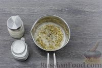 Фото приготовления рецепта: Овсяная каша с сыром и луком - шаг №5