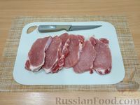 Фото приготовления рецепта: Свиные отбивные в кокосовой панировке - шаг №2
