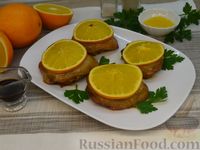 Фото приготовления рецепта: Куриные бёдрышки в маринаде, запечённые с апельсинами - шаг №12