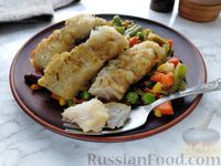 Фото приготовления рецепта: Рыба, тушенная с замороженными овощами - шаг №7
