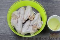 Фото приготовления рецепта: Куриные крылышки, запечённые в соево-лимонном соусе - шаг №4