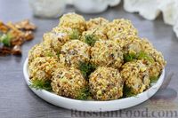 Фото к рецепту: Сырные шарики с черносливом и орехами