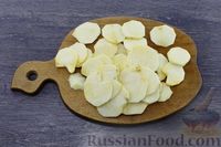 Фото приготовления рецепта: Картофель, запечённый с репой и сливками - шаг №3