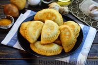 Фото приготовления рецепта: Жареные пирожки с пряной картофельно-куриной начинкой - шаг №26
