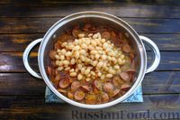 Фото приготовления рецепта: Суп с квашеной капустой, копчёными колбасками и фасолью - шаг №15