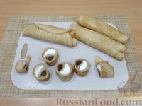 Фото приготовления рецепта: Рулетики из блинов с начинкой из творога и изюма - шаг №23