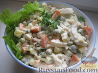 Фото к рецепту: Салат из кальмаров с картофелем и морковью