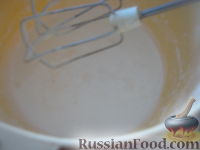 Фото приготовления рецепта: Пасхальный кулич с цукатами и изюмом - шаг №13