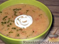 Фото приготовления рецепта: Картофельный суп-пюре с чесноком, помидорами и перцем - шаг №14
