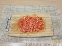 Фото приготовления рецепта: Рыбный суп из минтая с овощами - шаг №3