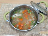 Фото приготовления рецепта: Рыбный суп из минтая с овощами - шаг №10