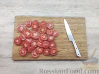 Фото приготовления рецепта: Филе минтая, запечённое с помидорами и луком - шаг №6