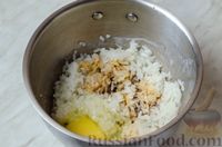 Фото приготовления рецепта: Запечённый рулет из скумбрии с рисом и сыром - шаг №4