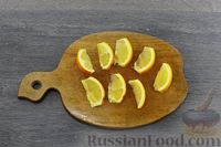 Фото приготовления рецепта: Рыба с апельсинами, сыром и орехами (в духовке) - шаг №7