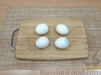 Фото приготовления рецепта: Яйца, фаршированные крабовыми палочками и икрой - шаг №3