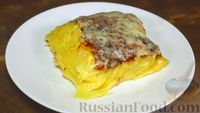 Фото к рецепту: Картофель в духовке, запечённый с тремя видами сыра