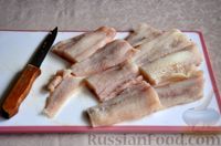 Фото приготовления рецепта: Рыба, запечённая под морковно-сырной шубкой - шаг №2