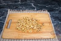 Фото приготовления рецепта: Дрожжевые слоёные пирожки с картошкой и маринованными грибами (в духовке) - шаг №4