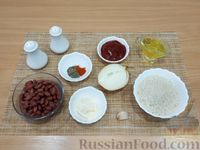 Фото приготовления рецепта: Рис с фасолью в томатном соусе (на сковороде) - шаг №1