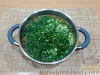 Фото приготовления рецепта: Суп с рисом, черемшой и яйцами - шаг №12