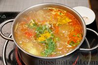Фото приготовления рецепта: Куриный суп с овощами и яйцами - шаг №12