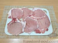 Фото приготовления рецепта: Свиные рулетики с морковно-луковой начинкой - шаг №10