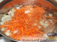 Фото приготовления рецепта: Суп с фрикадельками и кукурузной крупой - шаг №13