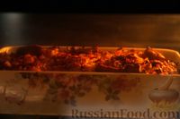 Фото приготовления рецепта: Свинина, запечённая с перловой кашей (в духовке) - шаг №12