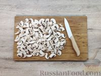 Фото приготовления рецепта: Картофельная запеканка с грибами - шаг №7