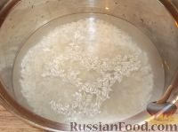 Фото приготовления рецепта: Кальмары, фаршированные рисом, луком и яйцом - шаг №2
